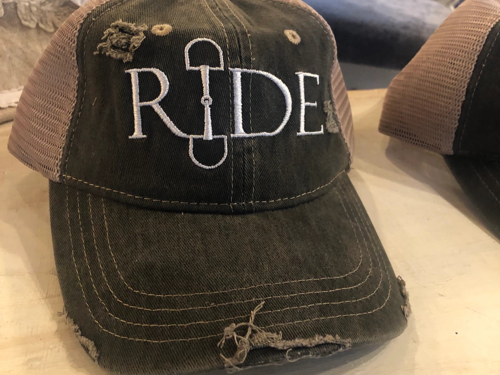 RIDE Embroidered Distressed Trucker Hat